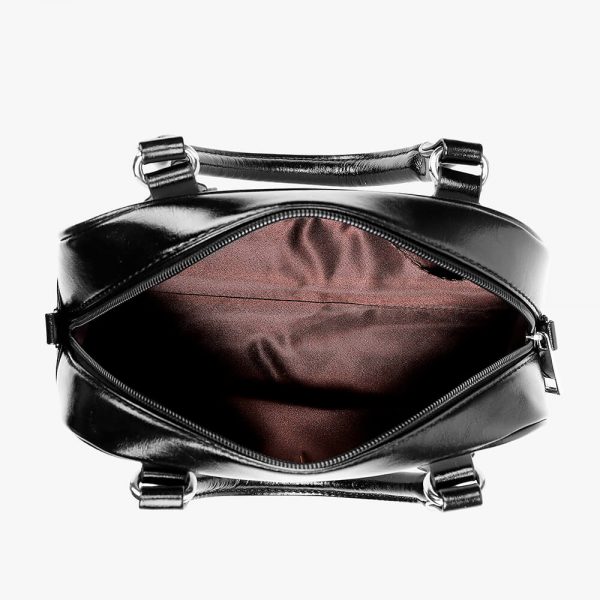 An opened saddle bag lays horizontally