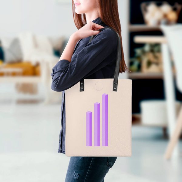 A woman carries an off-white handbag with a purple bar graph printed on it