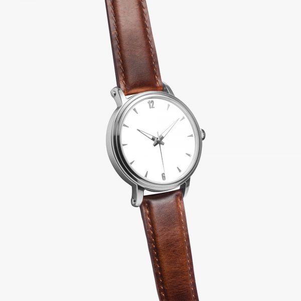 A mechanical watch with a white dial and a brown strap.