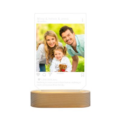 A photo of a happy family is customised on an acrylic night light