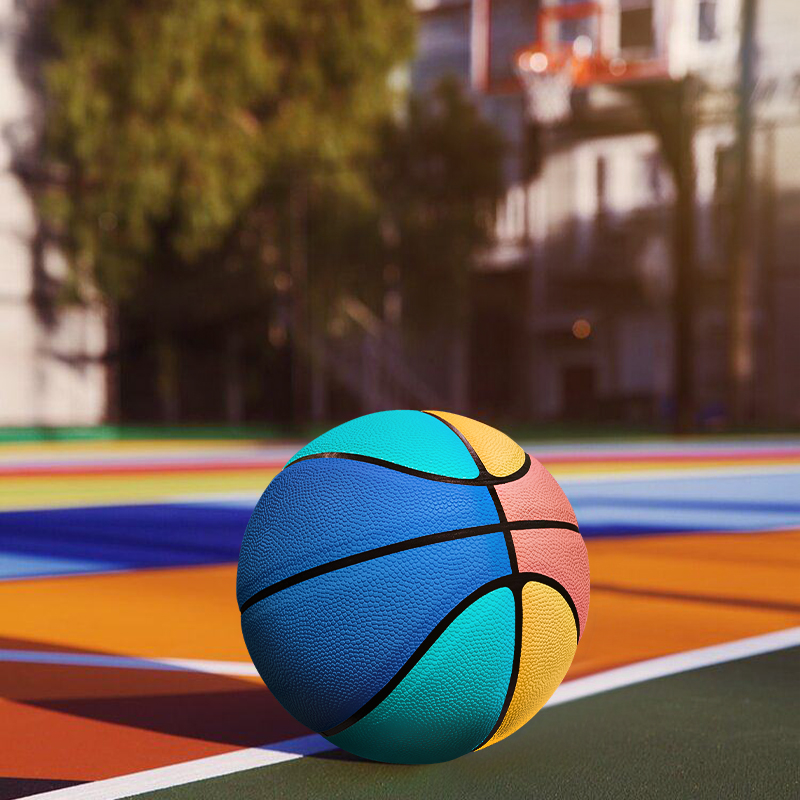 A colorful basketball is placed on the basketball court