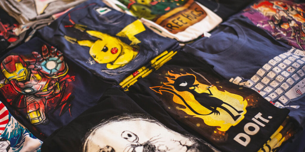 Lots of graphic T-shirts with pop culture graphics