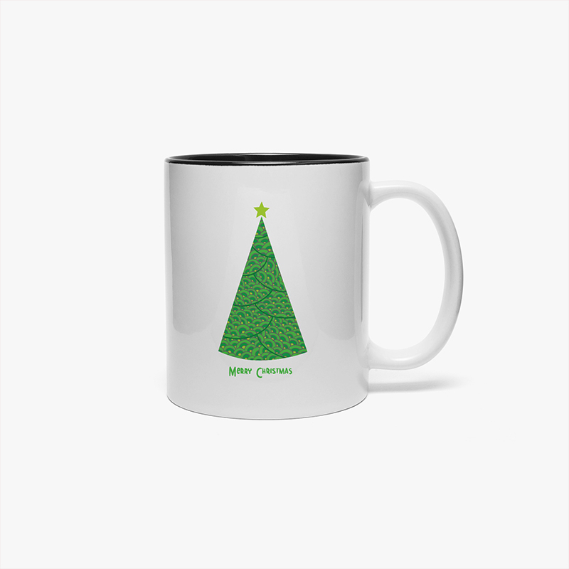 A mug with a Christmas tree design