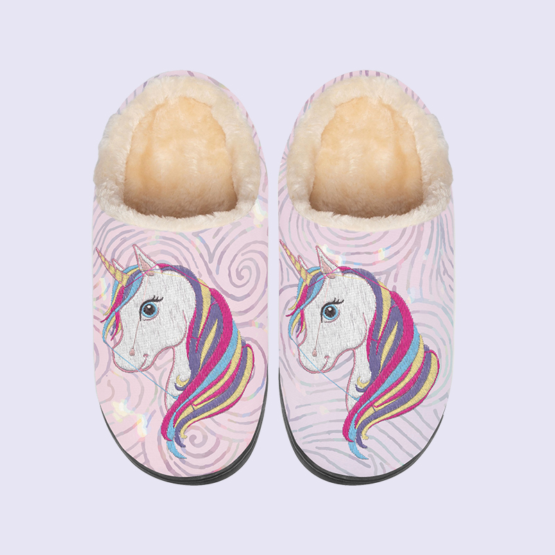 A pair of embroidered unicorn slippers