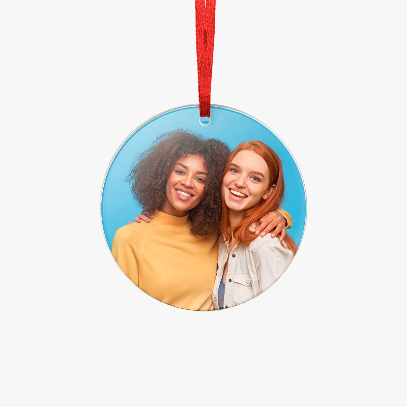 Round acrylic ornaments with photos of friends