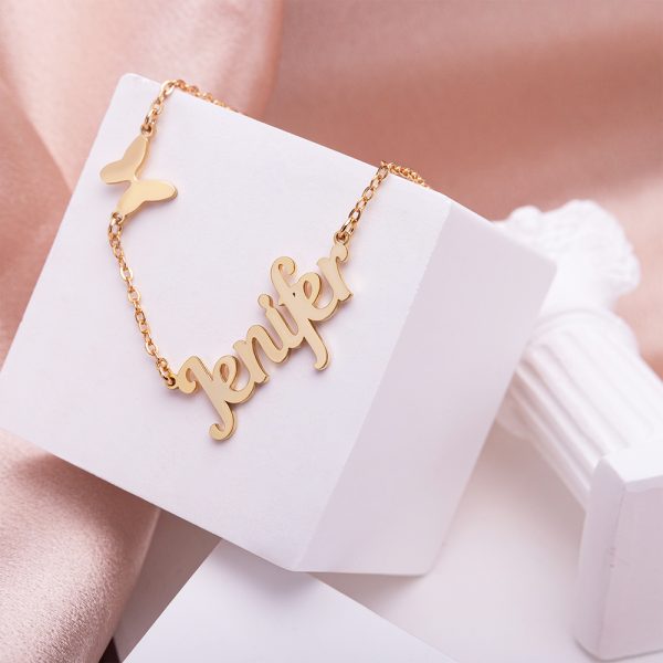 A gold necklace with a customizable name