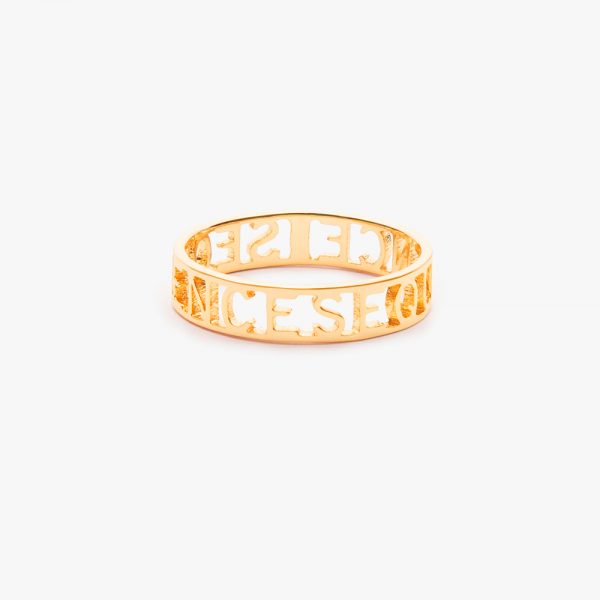 a gold ring with Roman numerals