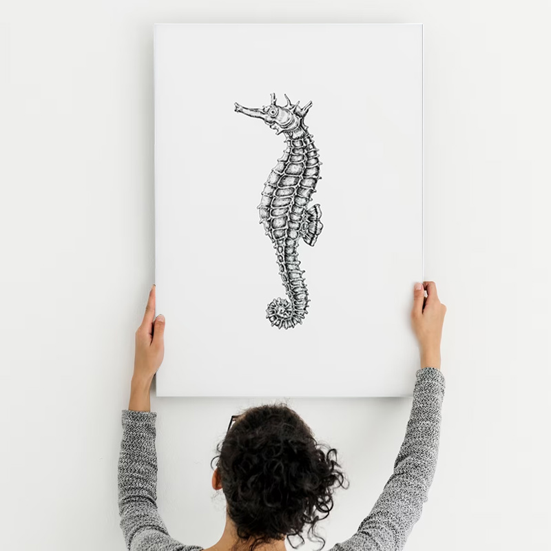 A canvas print with a seahorse printed on it