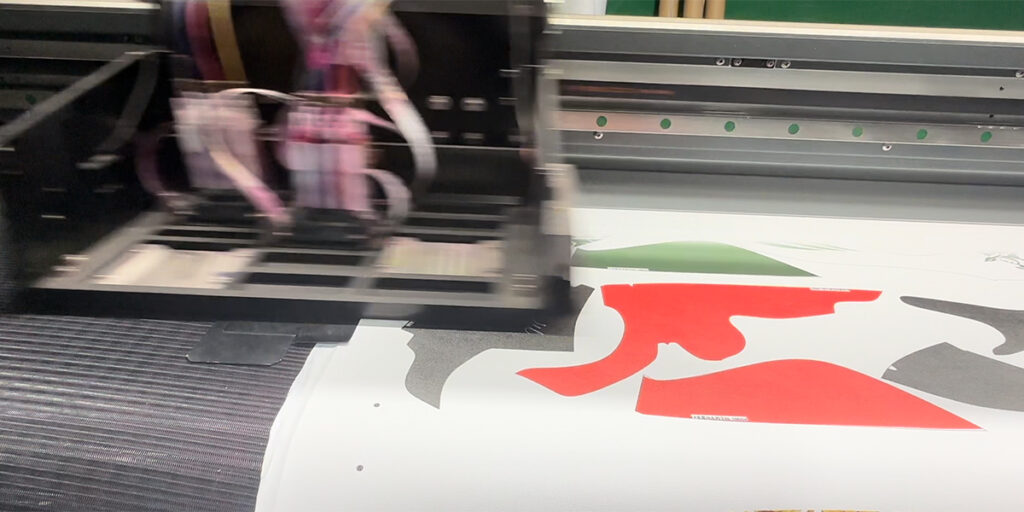 A dye sublimation machine is printing the product